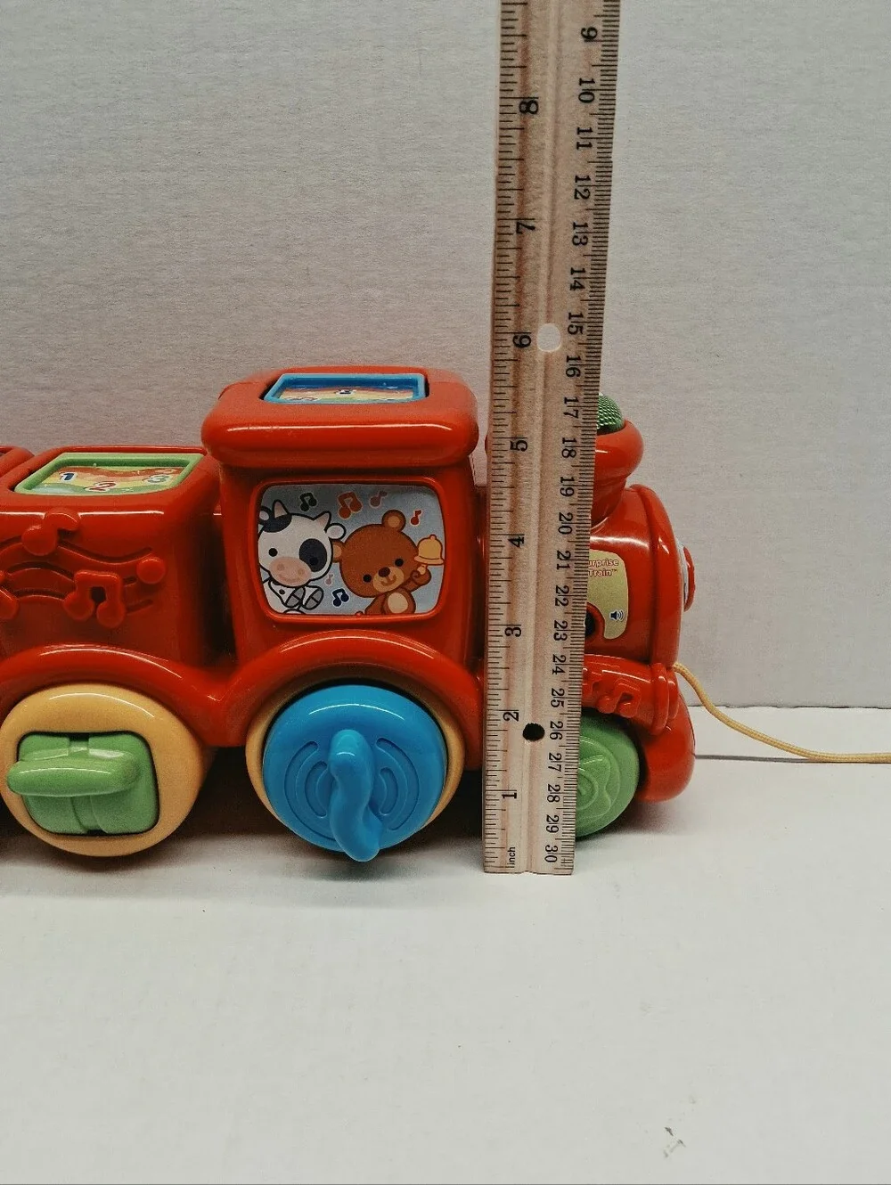 Red Pull-Along Animal Train Toy with Interactive Shapes